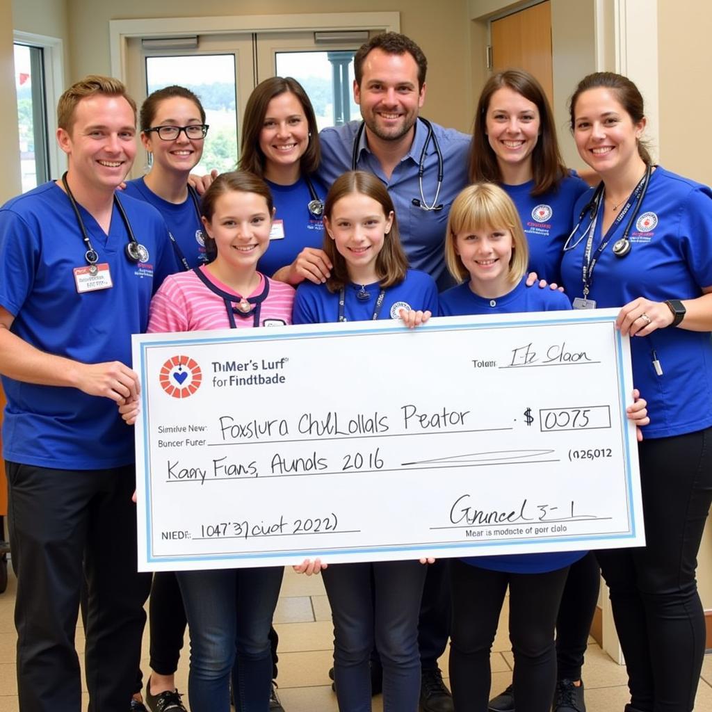 A celebratory moment at the Corporate Cup with Boston Children's Hospital representatives