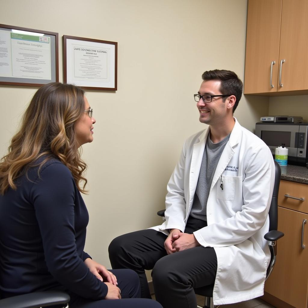  Dr. Catalane Engaging in a Consultation with a Patient at St. Clair Hospital 