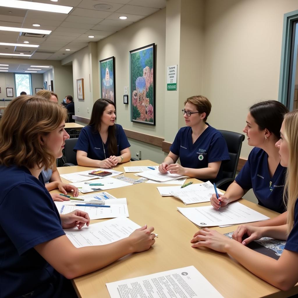 Hospital staff discussing mural design with an artist