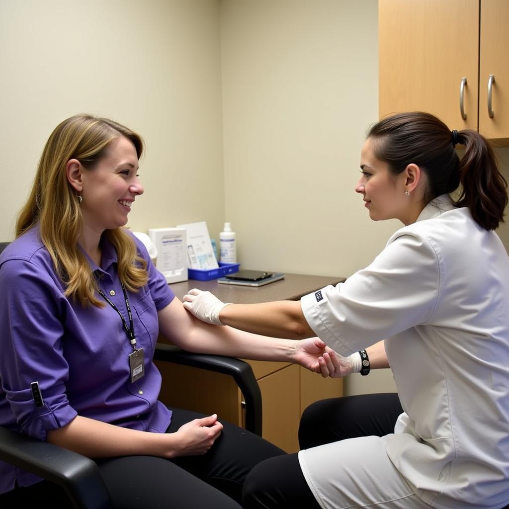 A patient undergoing a blood test at White Plains Hospital