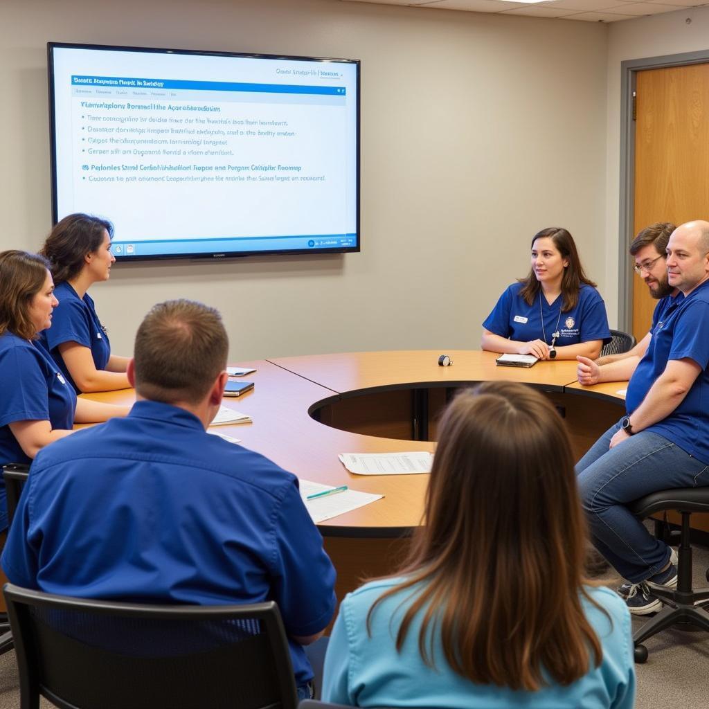 Saint Joseph Hospital staff attending an employee benefits meeting.