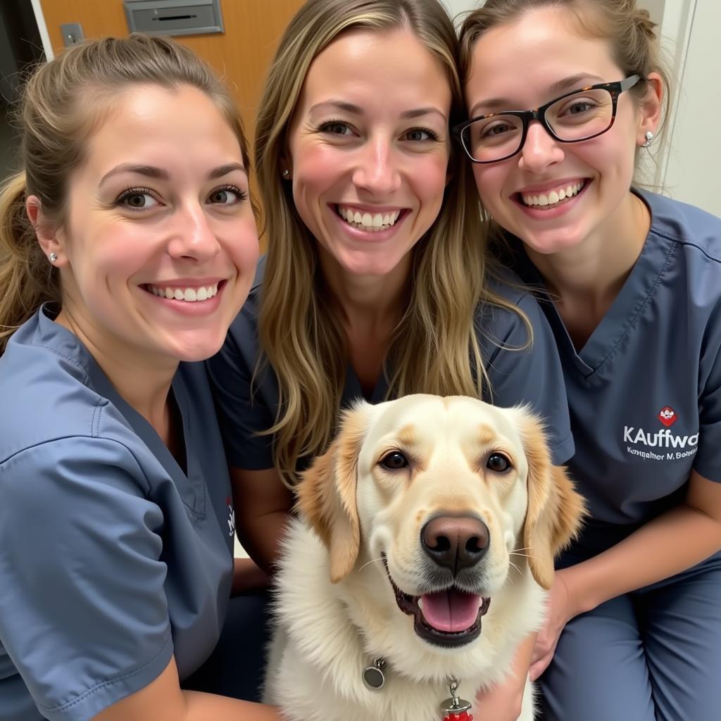 Veterinary Team posing with a dog and cat