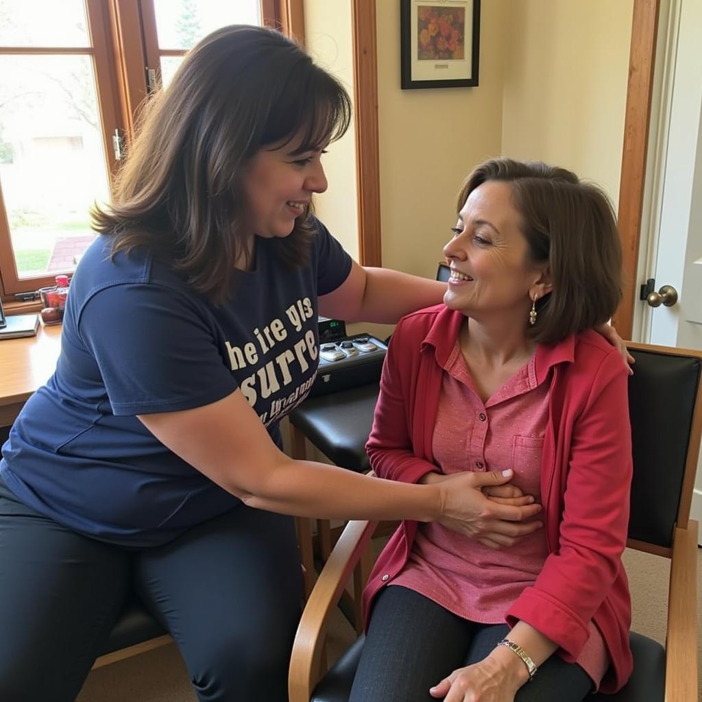 A compassionate volunteer offers support to a guest at Secu Family House