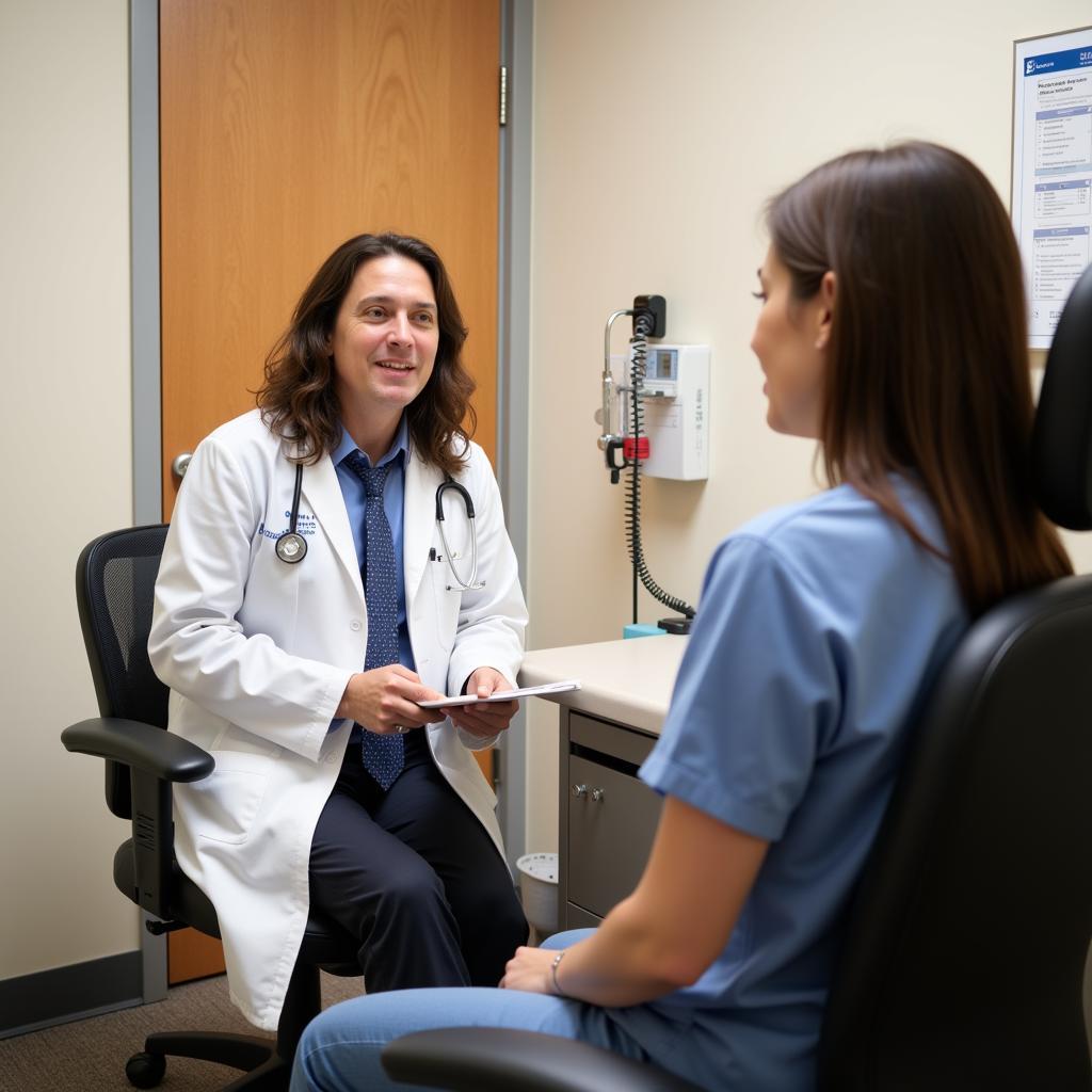 Doctor Consulting with Patient at Beaver County Hospital