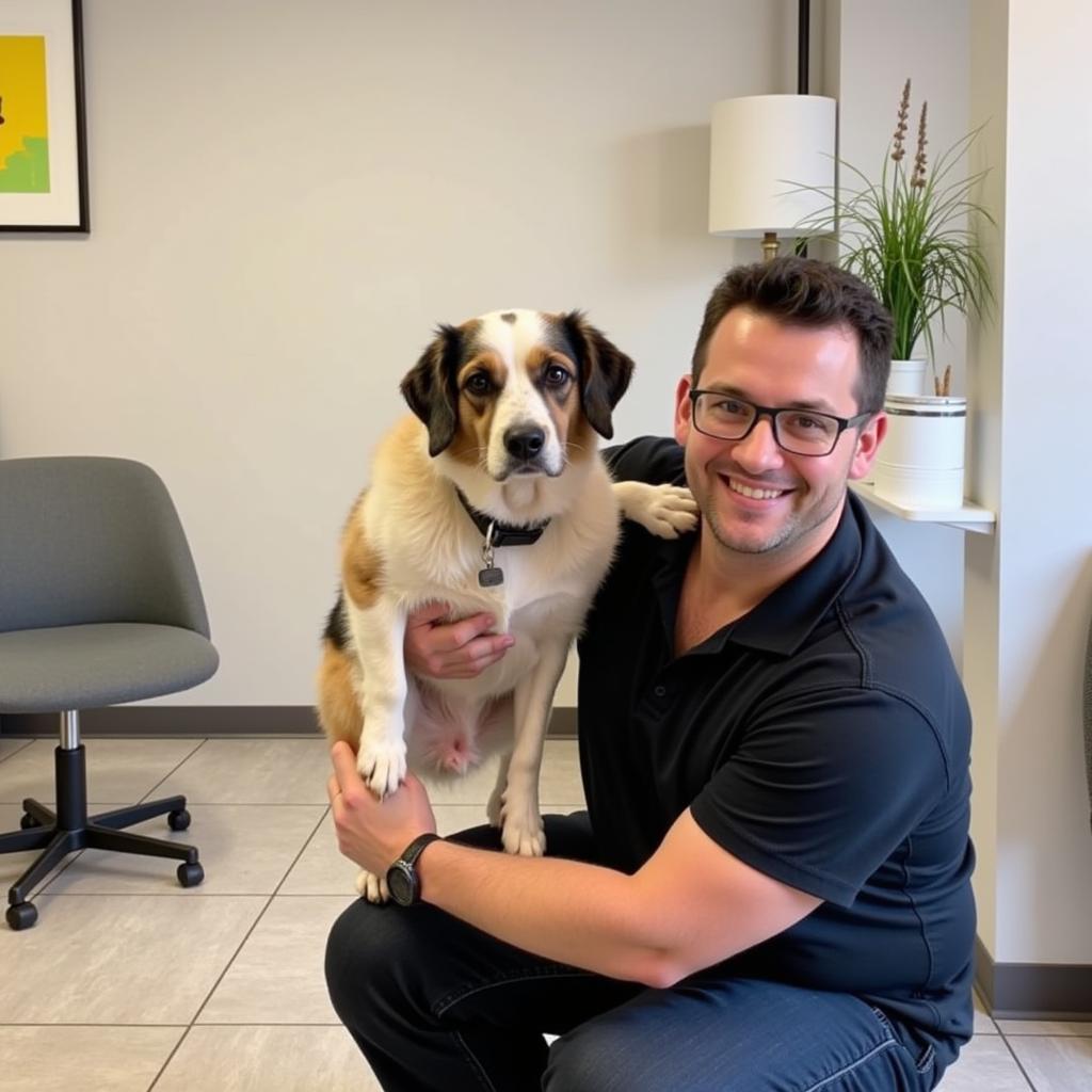 Happy Pet Owner at Park Centre Animal Hospital